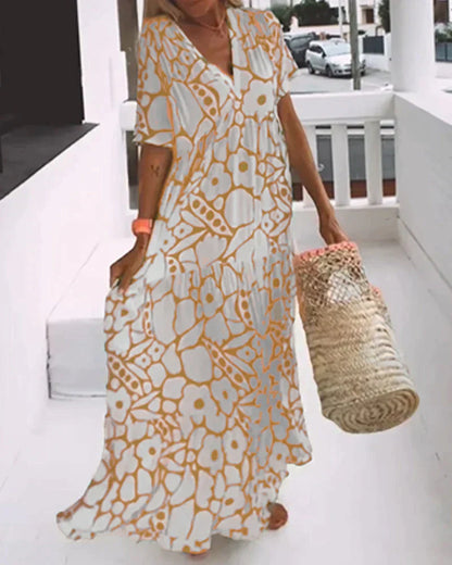 LOOSE-FIT PRINTED DRESS WITH V-NECKLINE