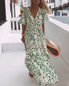LOOSE-FIT PRINTED DRESS WITH V-NECKLINE