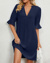 Emélie – subtle elegance in a flowing V-neck dress