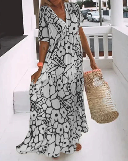 LOOSE-FIT PRINTED DRESS WITH V-NECKLINE