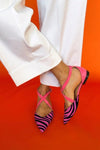 Zarella – wild grace with crossed ankle allure