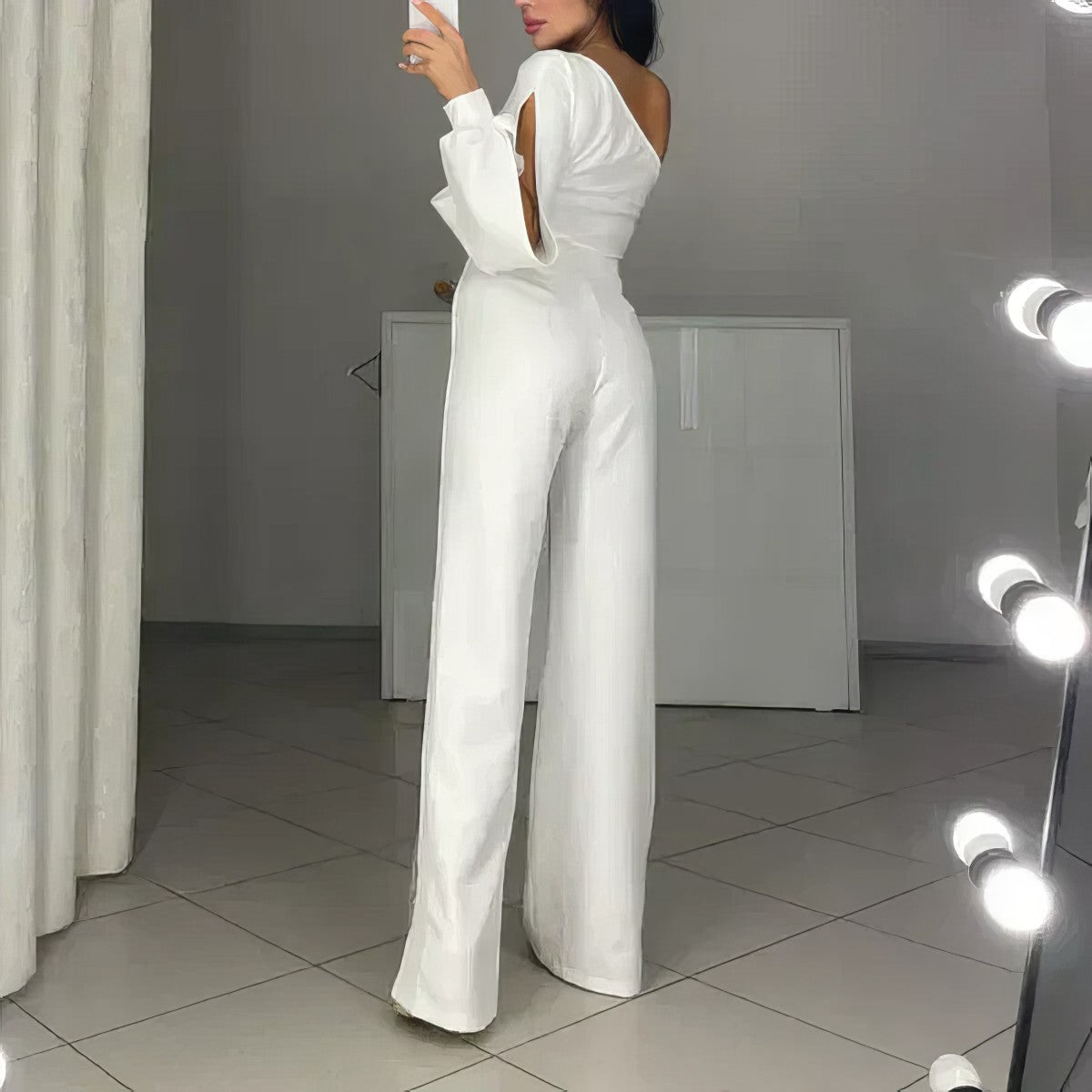 ASYMMETRICAL ONE-SHOULDER JUMPSUIT WITH FLARED TULLE SLEEVES
