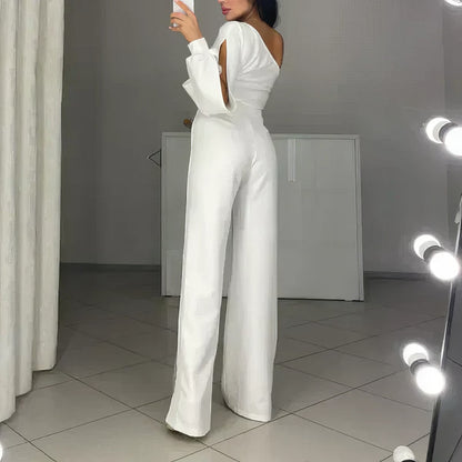ASYMMETRICAL ONE-SHOULDER JUMPSUIT WITH FLARED TULLE SLEEVES