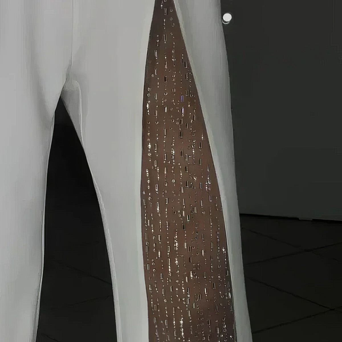 ASYMMETRICAL ONE-SHOULDER JUMPSUIT WITH FLARED TULLE SLEEVES